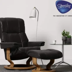 Stressless Mayfair fåtölj inkl. pall – läder batick svart/ teakbets